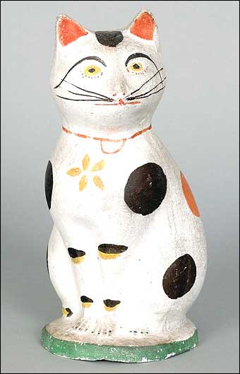 Signs of Spring at Pook and Pook - Nineteenth century chalkware cat which sold for $20,415
