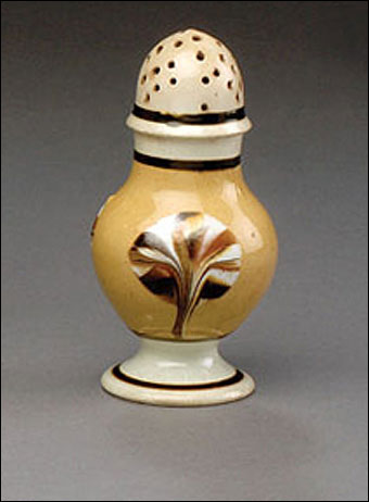 Mochaware - British pearlware mochaware dipped fan pattern pepper pot, ca. 1820. Of baluster form, banded in dark brown with three dark brown, rust, tan, and white fans on a butternut slip field, 4 1/2
