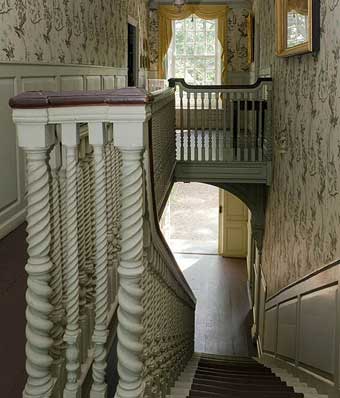 Royall House - Interior View of the Isaac Royall House, Upstairs Hall, note the double-spiraled newel, twisted balusters,  photo courtesy of Theresa Kelliher, Board Member of the Royall House Association
