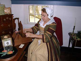 Vanderveer House - Elissa Parish demonstrating tape loom weaving in the Bed Chambers on the second floor 
