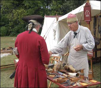 Washingtonburg, PA - A Redcoat gentleman discussing a possible sale with a Erv Tschanz of Gen-Nis-He-Yo