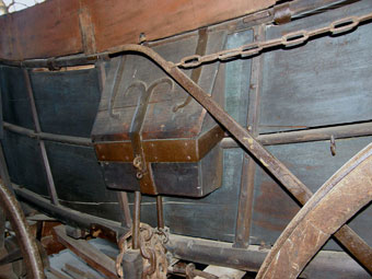 Conestoga Wagon - A toolbox attached to a Conestoga wagon with decorative ironwork, private collection