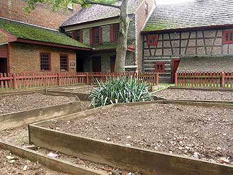 Foursquare Gardens - Foursquare garden at the Golden Plough Tavern in York, Pennsylvania. Due to all the rain this year, they are slightly behind in planting the garden.