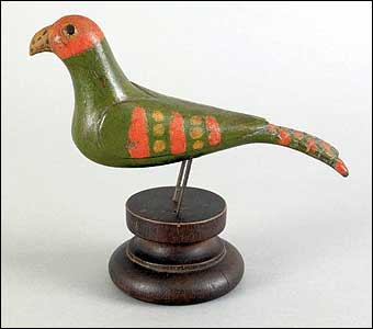 Signs of Spring at Pook and Pook - Well executed polychrome painted parrot done by Schtockschnitzler Simmons sold for $26,070
