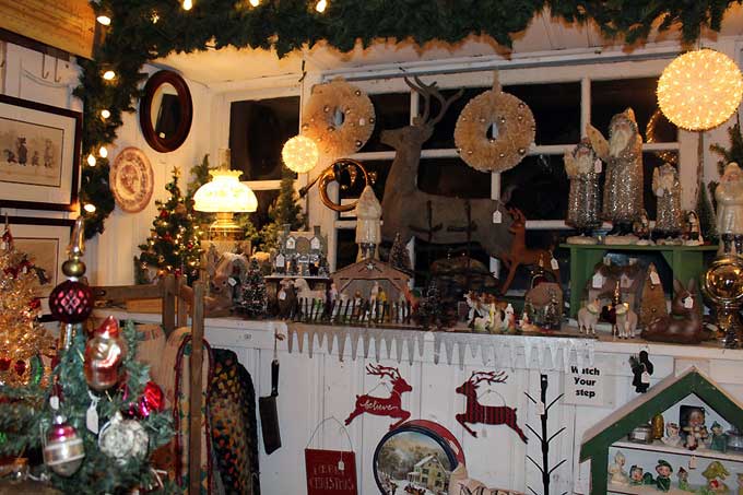 Brandywine River Antiques Market: Chadds Ford, PA - A booth decorated with vintage Christmas items.
