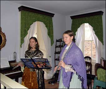 Hopewell Furnace, PA - Inside the Big House or Ironmaster's Mansion which was decorated for Christmas in the 1875 tradition. Flutists Alannah Sellman and Rachael Smith played Christmas music

